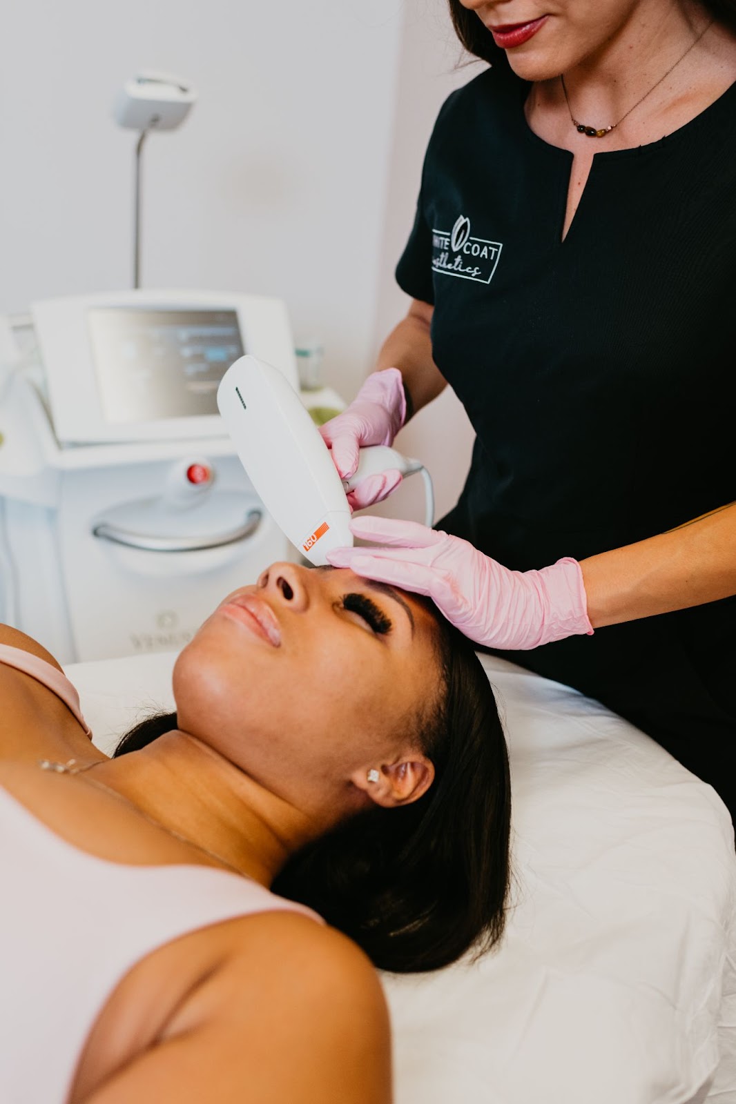 Young Woman Getting Microneedling Treatment in Las Vegas, NV | White Coat Aesthetics