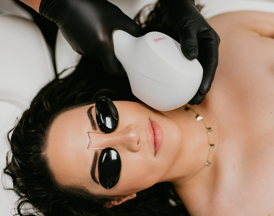 Beautiful Woman Getting IP Laser Facial Treatment | White Coat Aesthetics in Las Vegas, NV