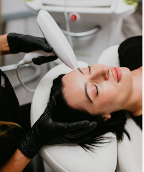 Beautician conducts a facial rejuvenation procedure for a brunette woman | White Coat Aesthetics in Las Vegas, NV