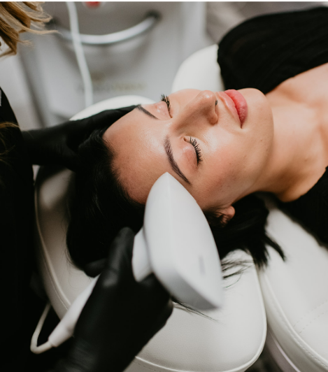 Woman Receiving Facial Treatment | White Coat Aesthetics in Las Vegas, NV
