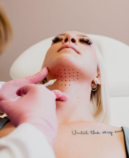 Beautiful Woman Getting Kybella Treatment | White Coat Aesthetics in Las Vegas, NV